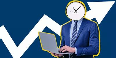 Ein Mann mit Laptop, der eine Uhr statt Kopf hat.